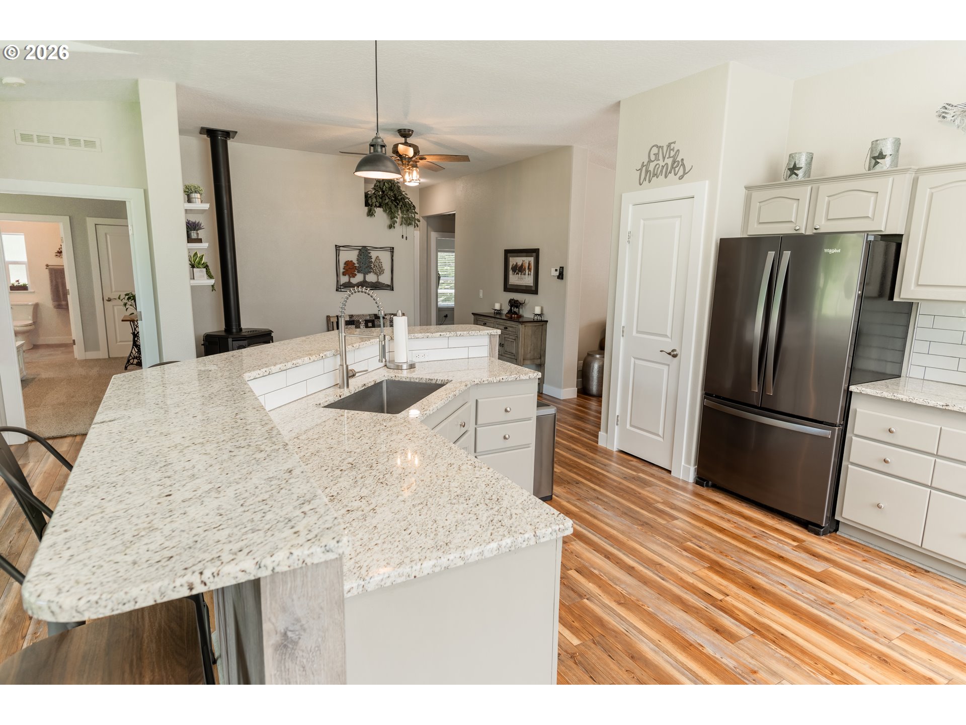 83440 Russell Lane Joseph, OR 97846 - Photo 7 of 19 a kitchen with refrigerator and countertop