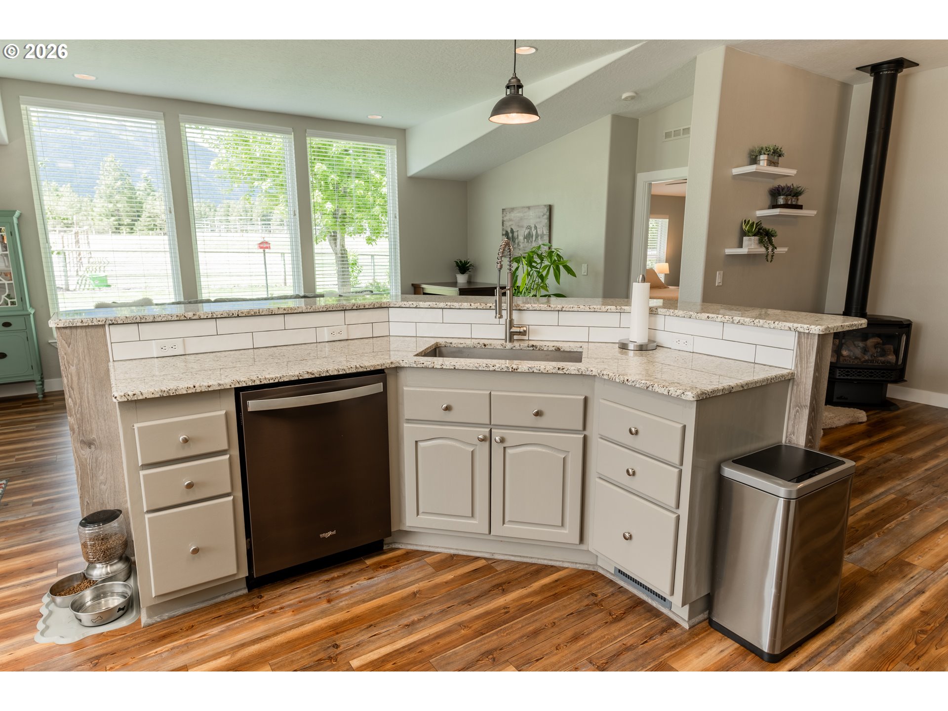 83440 Russell Lane Joseph, OR 97846 - Photo 8 of 19 a kitchen with a sink stove and cabinets