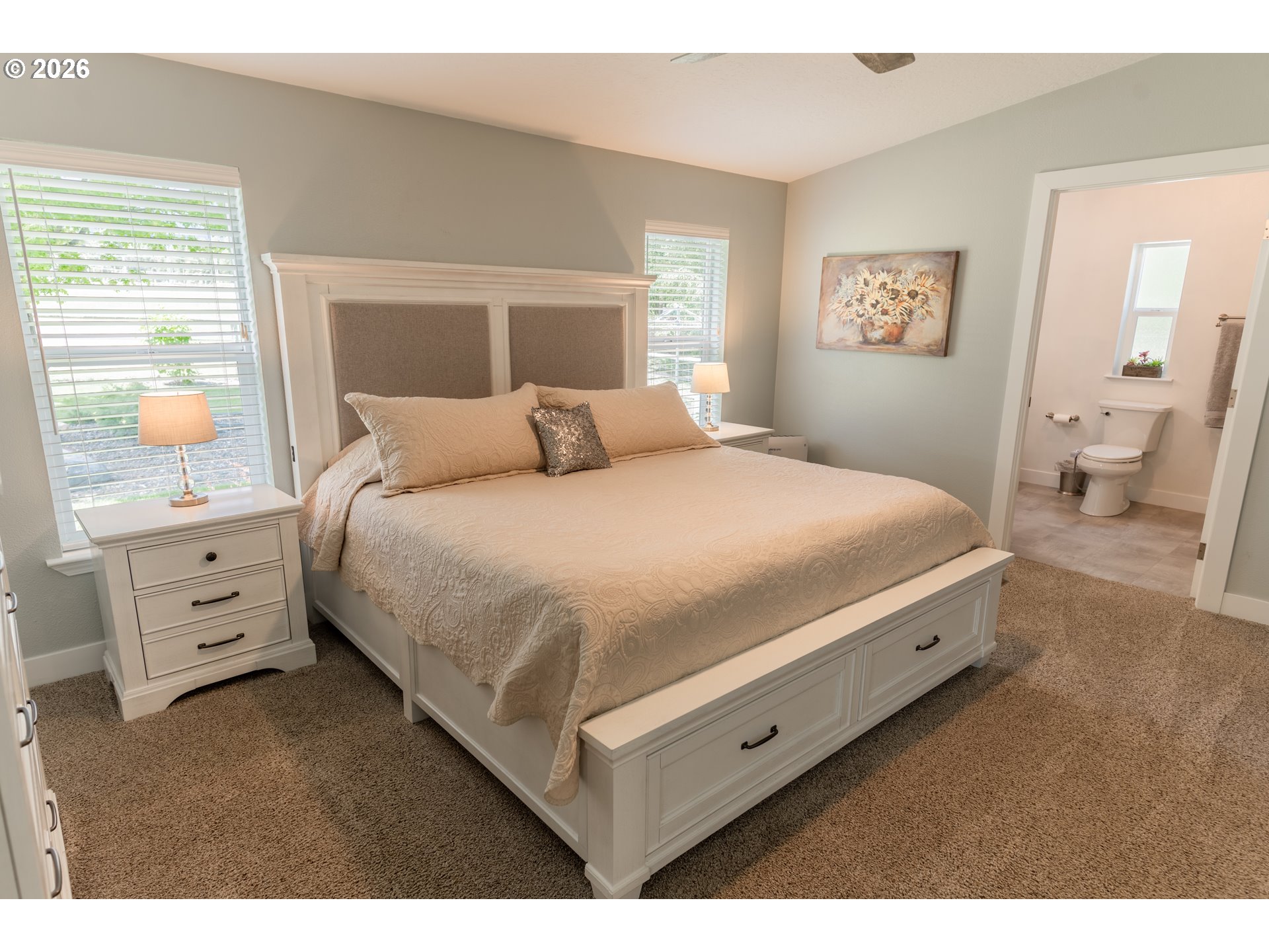 83440 Russell Lane Joseph, OR 97846 - Photo 10 of 19 a large bed sitting in a bedroom and a table
