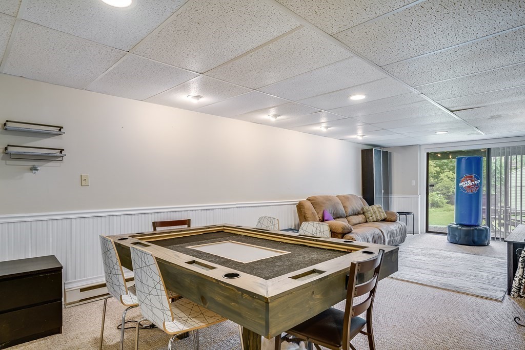 31 Hunters Run Place, Unit 31 Haverhill, MA 01832 - Photo 22 of 32 a dining room with furniture and window