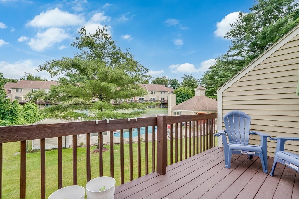 31 Hunters Run Place, Unit 31 Haverhill, MA 01832 - Photo 25 of 32 a view of a two chairs in the deck