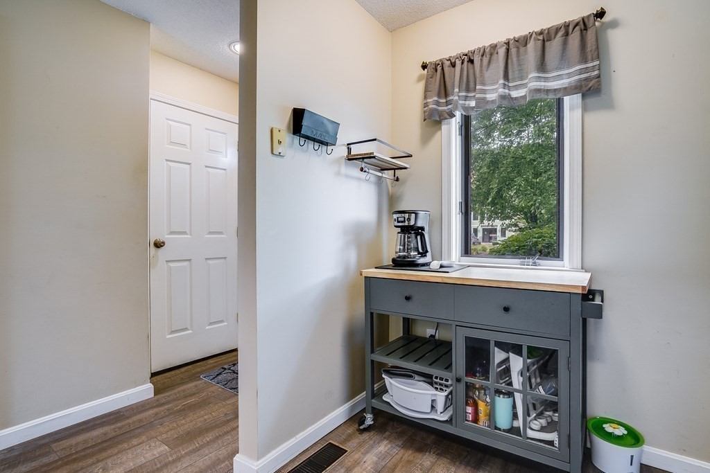 31 Hunters Run Place, Unit 31 Haverhill, MA 01832 - Photo 6 of 32 a room that has a bed and a window in it