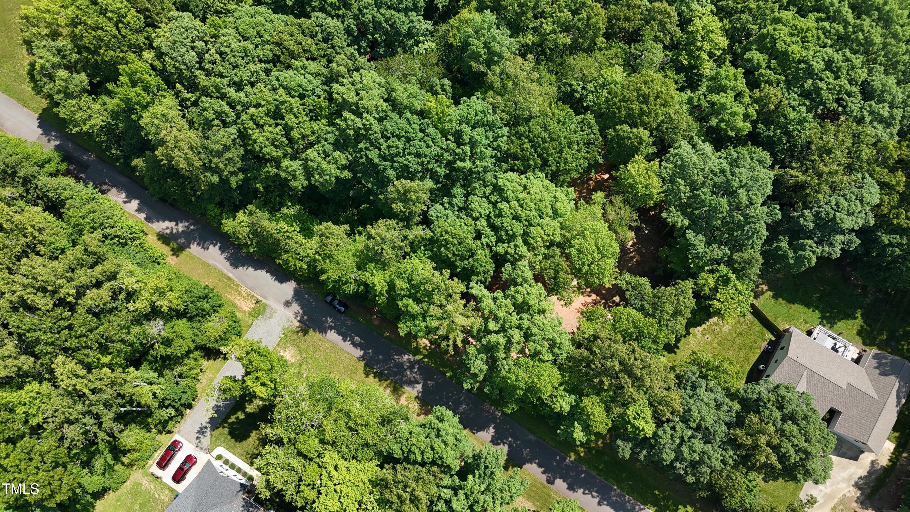 0 Thunder Road Rougemont, NC 27572 - Photo 4 of 14 an aerial view of a house with a yard