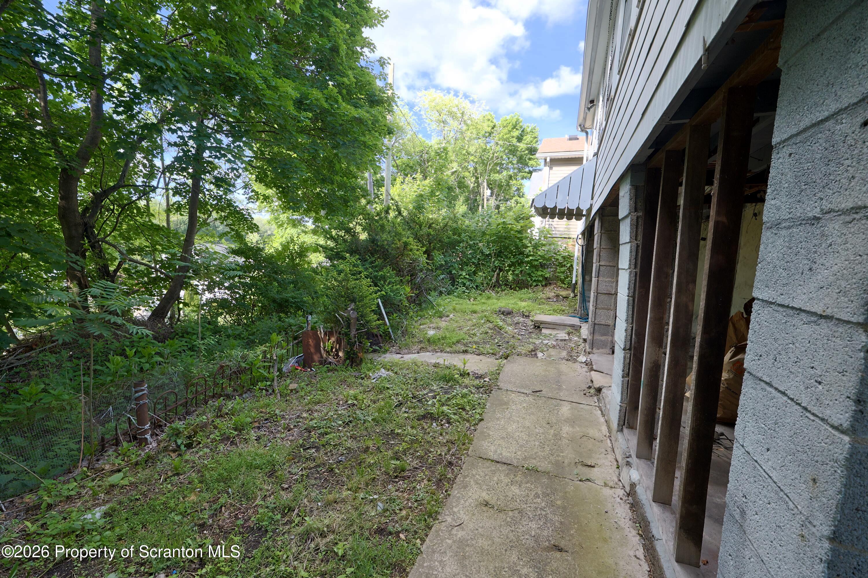 827 Main Street Sugar Notch, PA 18706 - Photo 24 of 25 a view of a yard with trees
