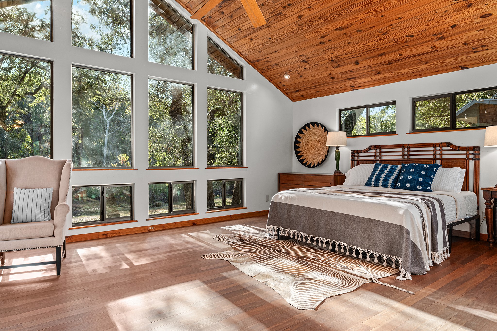 505 Deer Lake Road Wimberley, TX 78676 - Photo 14 of 38 Primary Bedroom with Vaulted Ceilings Overlooking Creek