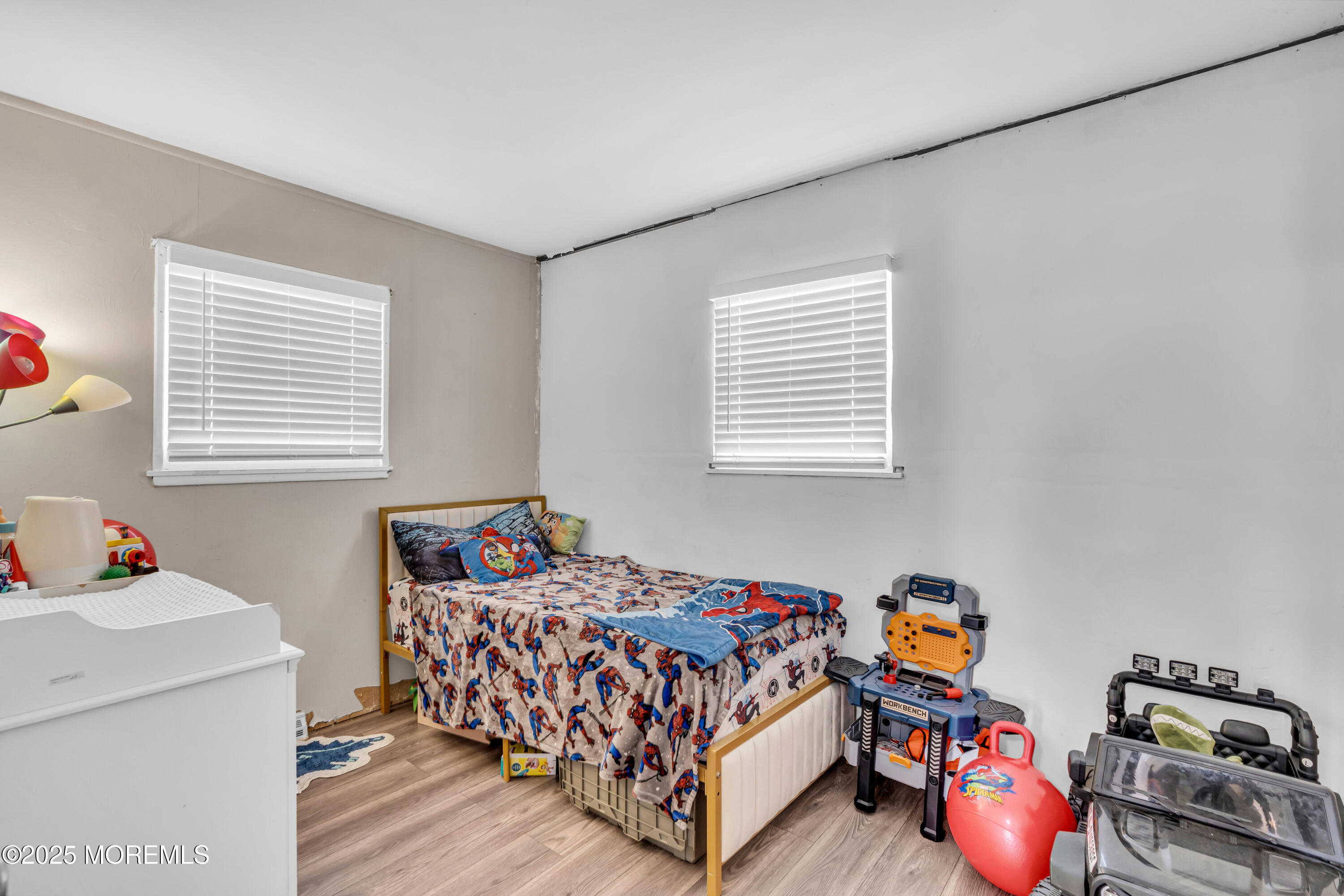 111 3rd Street Barnegat, NJ 08005 - Photo 18 of 22 a bedroom with bed and a window