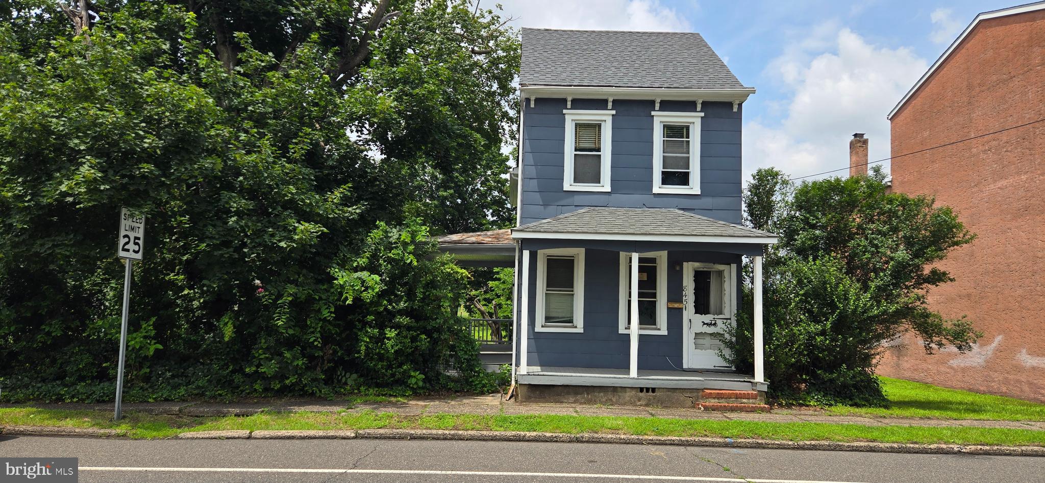 845 Bordentown Road Burlington, NJ 08016 - Photo 1 of 17 a view of a house with a yard plants and large tree