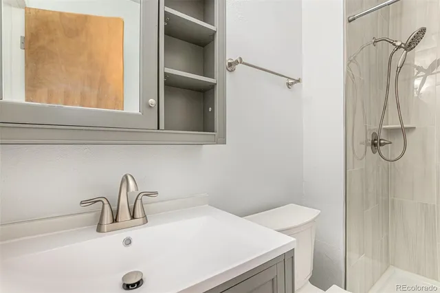 a bathroom with a sink and a vanity