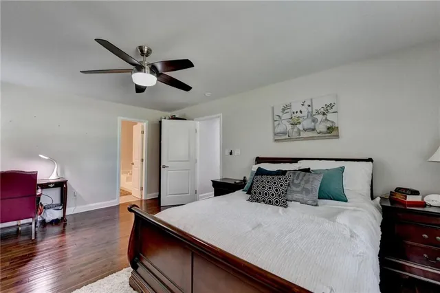 a view of balcony with wooden floor and outdoor seating