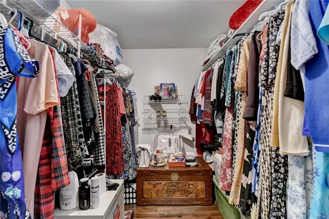 an aerial view of a house with a yard and outdoor seating