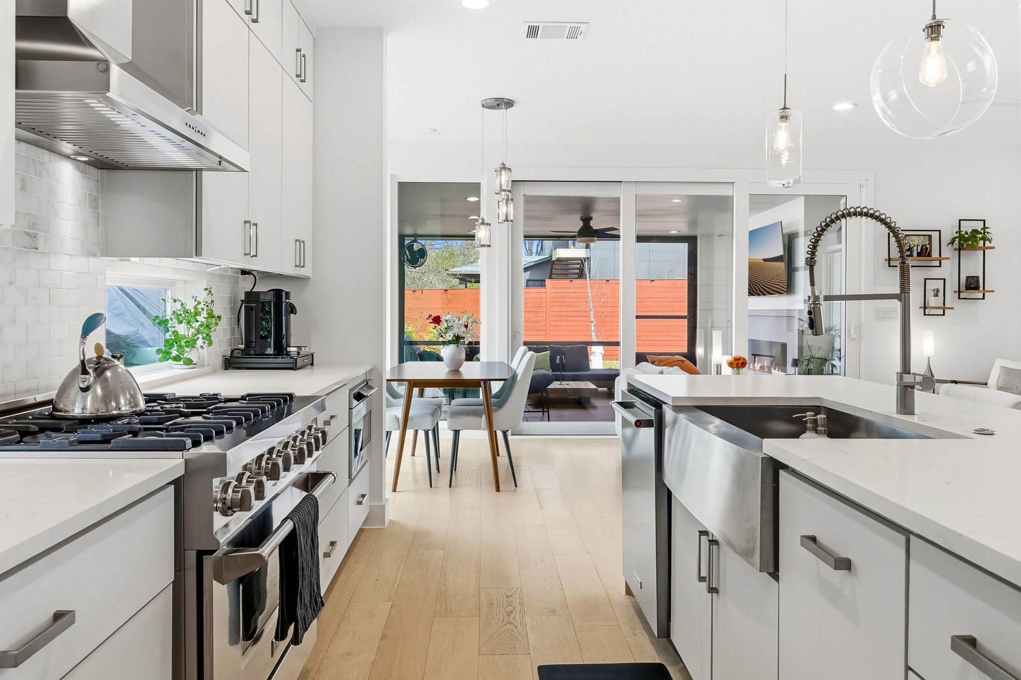 2508 Paramount Avenue, Unit B Austin, TX 78704 - Photo 37 of 40 Gorgeous quartz countertops and ample prep space are ideal for your culinary delights while the open floor plan connects you with everyone while working in the kitchen.