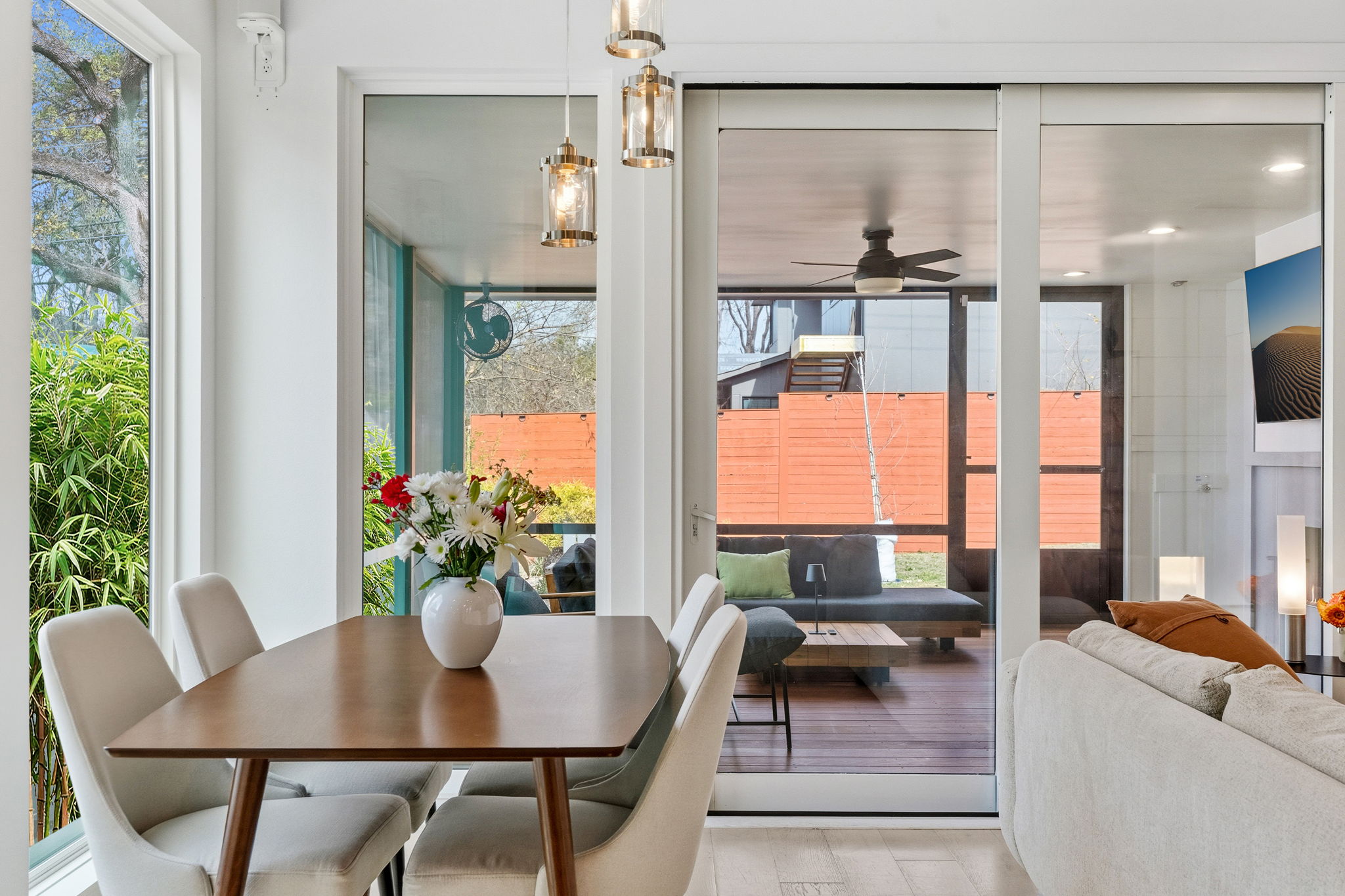 2508 Paramount Avenue, Unit B Austin, TX 78704 - Photo 16 of 40 The dining area is tucked in corner windows with seamless connectivity to the kitchen, living area, and sun room.