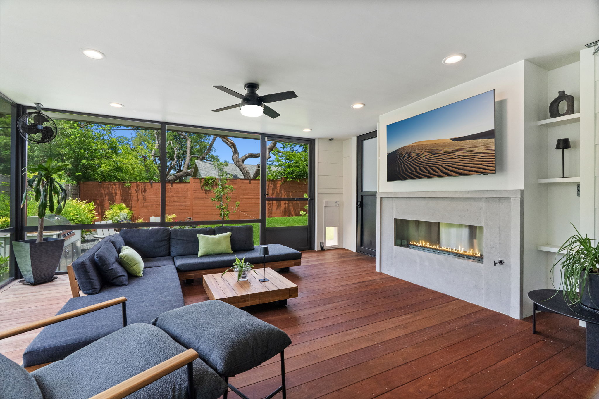 2508 Paramount Avenue, Unit B Austin, TX 78704 - Photo 3 of 40 Seamless indoor outdoor living with a wall of accordion glass sliders that opens onto this spectacular sun room addition.