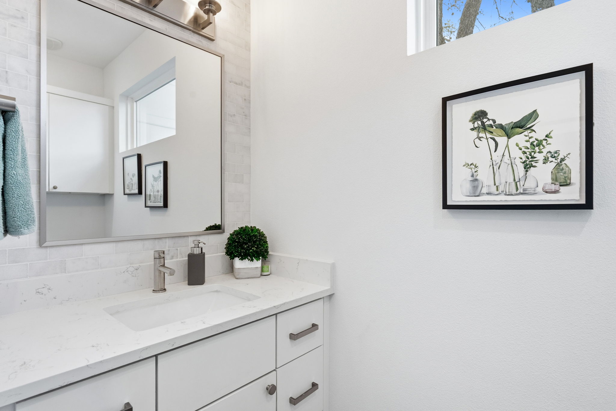 2508 Paramount Avenue, Unit B Austin, TX 78704 - Photo 30 of 40 The third floor bedroom also comes with a private bath complete with a quartz topped vanity a luxurious frameless glass enclosed walk-in shower.