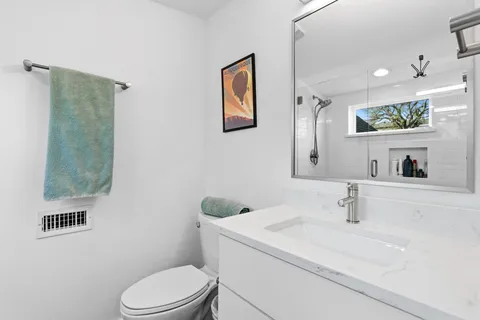a view of a kitchen with a sink dryer and washer