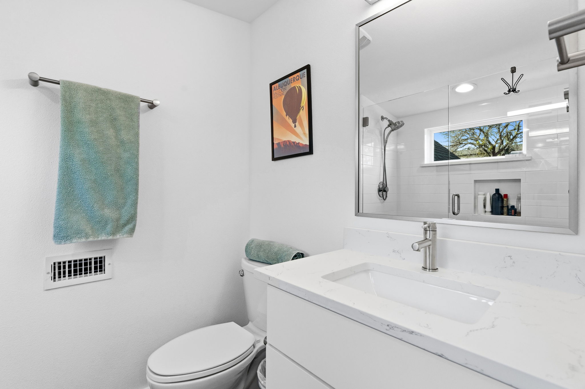 2508 Paramount Avenue, Unit B Austin, TX 78704 - Photo 32 of 40 There is also a well appointed main floor guest powder room behind a modern sliding barn door.