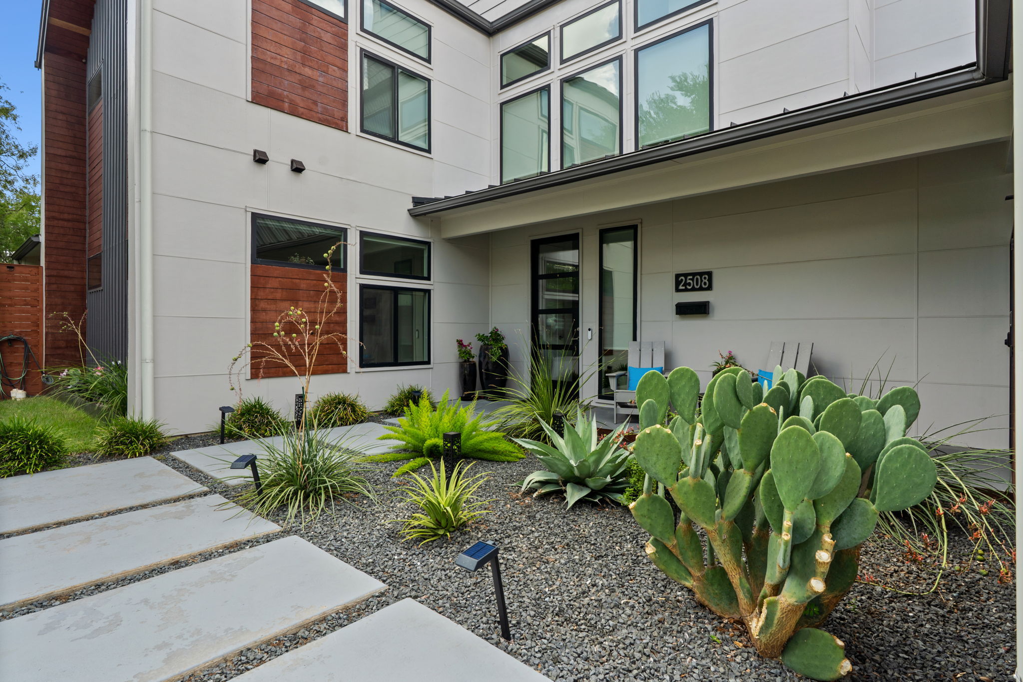 2508 Paramount Avenue, Unit B Austin, TX 78704 - Photo 36 of 40 Lush professional landscaping incorporates xeriscape, native plants, and just the right amount of irrigated lawn.