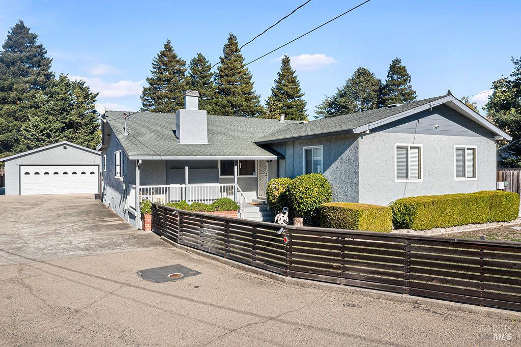 4071 Garden Road El Sobrante, CA 94803 - Photo 1 of 1 a front view of a house with garden