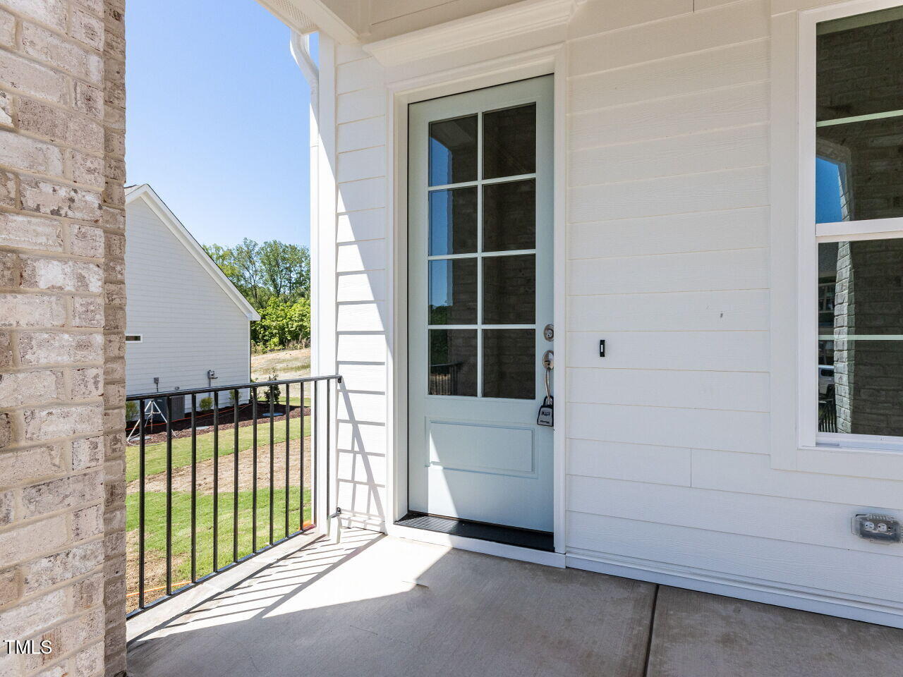 6048 Scalybark Road Durham, NC 27712 - Photo 4 of 37 004-1280x960-front-door