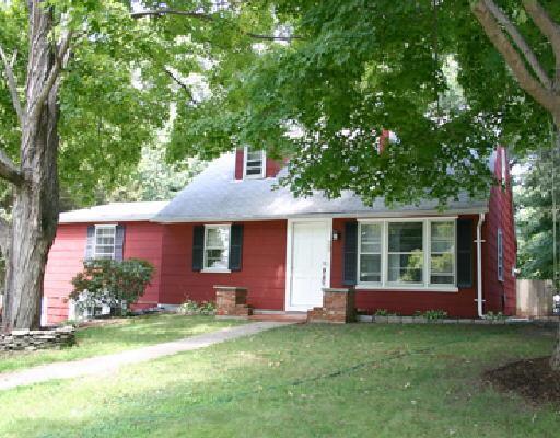 29 Ashton Road Stamford, CT 06905 - Photo 1 of 1 front view of a house with a garden