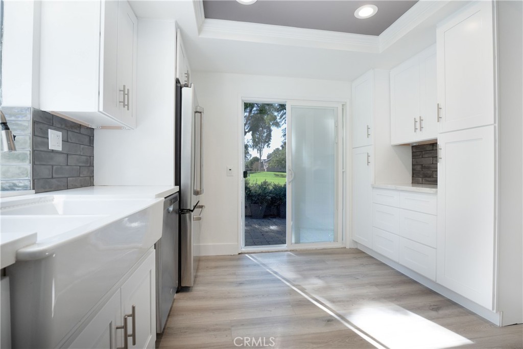 13 Brookmont, Unit 60 Irvine, CA 92604 - Photo 13 of 27 a bathroom with a sink and mirror