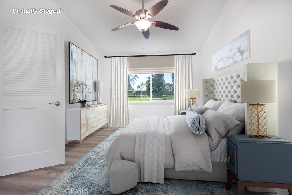 13 Brookmont, Unit 60 Irvine, CA 92604 - Photo 2 of 27 a bedroom with a bed and window