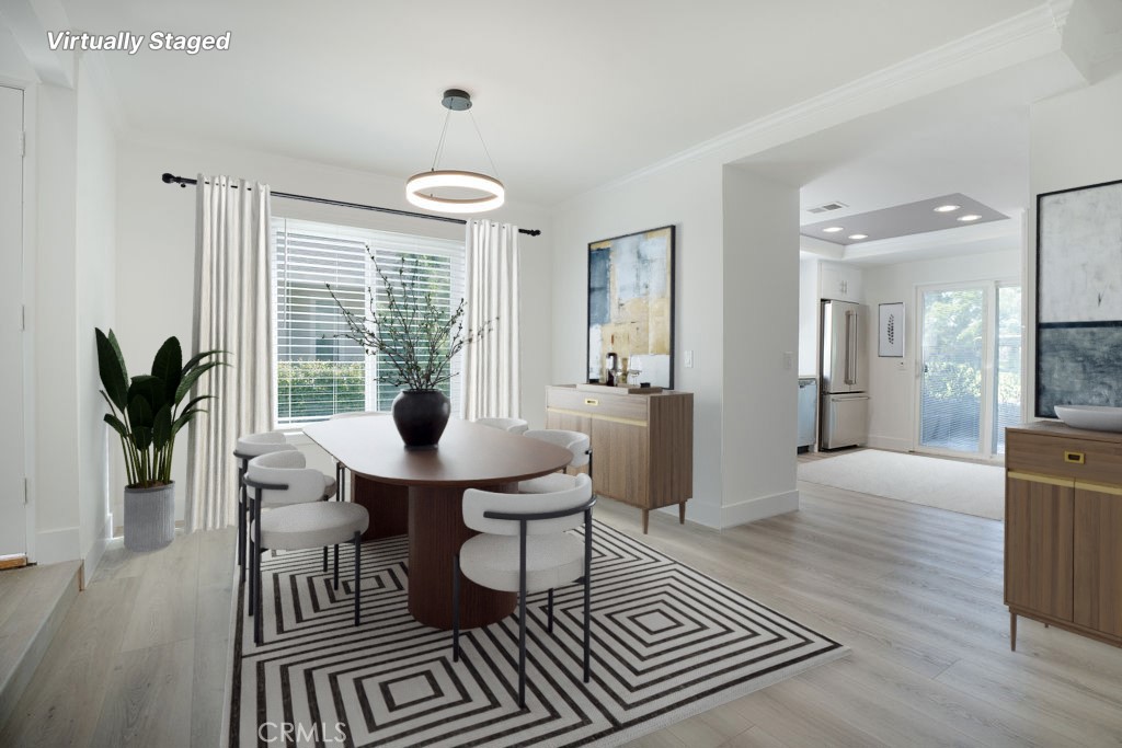 13 Brookmont, Unit 60 Irvine, CA 92604 - Photo 3 of 27 a view of a livingroom with furniture and a potted plant