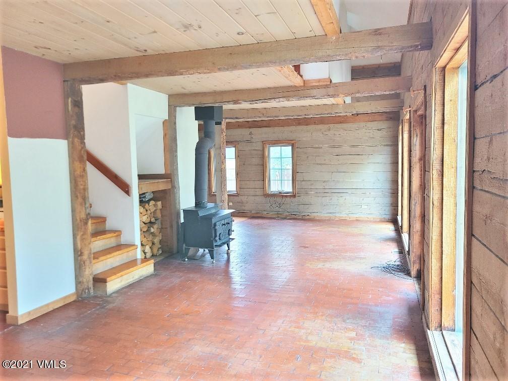 755 Bull Run Eagle, CO 81631 - Photo 16 of 19 a view of an entryway with wooden floor and a livingroom