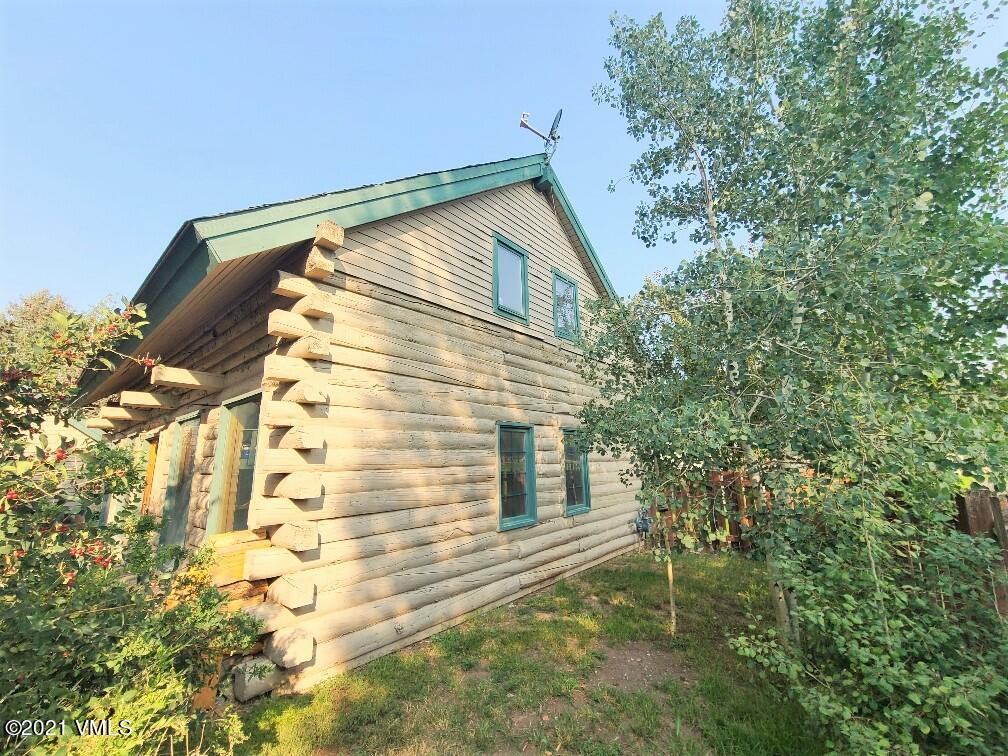 755 Bull Run Eagle, CO 81631 - Photo 7 of 19 a front view of a house with a yard