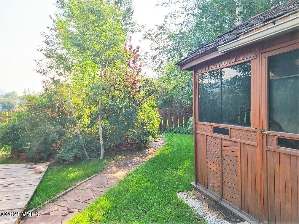 755 Bull Run Eagle, CO 81631 - Photo 8 of 19 a backyard of a house with lots of green space