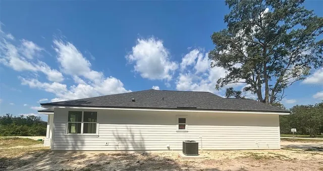 a view of a house with a iron gate