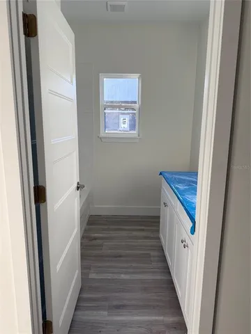 a view of hallway with stairs