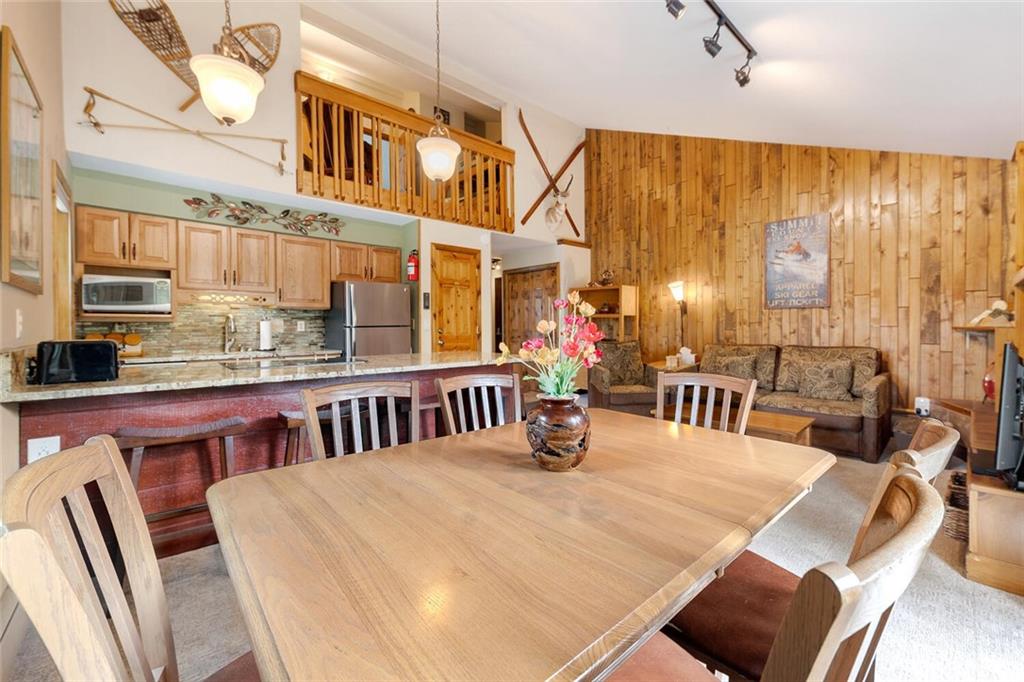 760 Columbine Road, Unit A12 Breckenridge, CO 80424 - Photo 2 of 35 a view of a dining room with furniture window and outside view