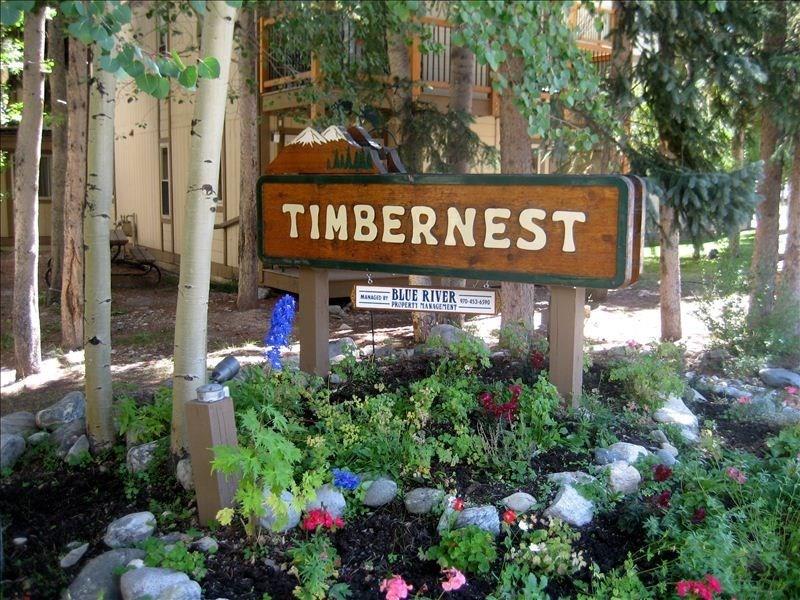 760 Columbine Road, Unit A12 Breckenridge, CO 80424 - Photo 27 of 35 a sign on the side of a building