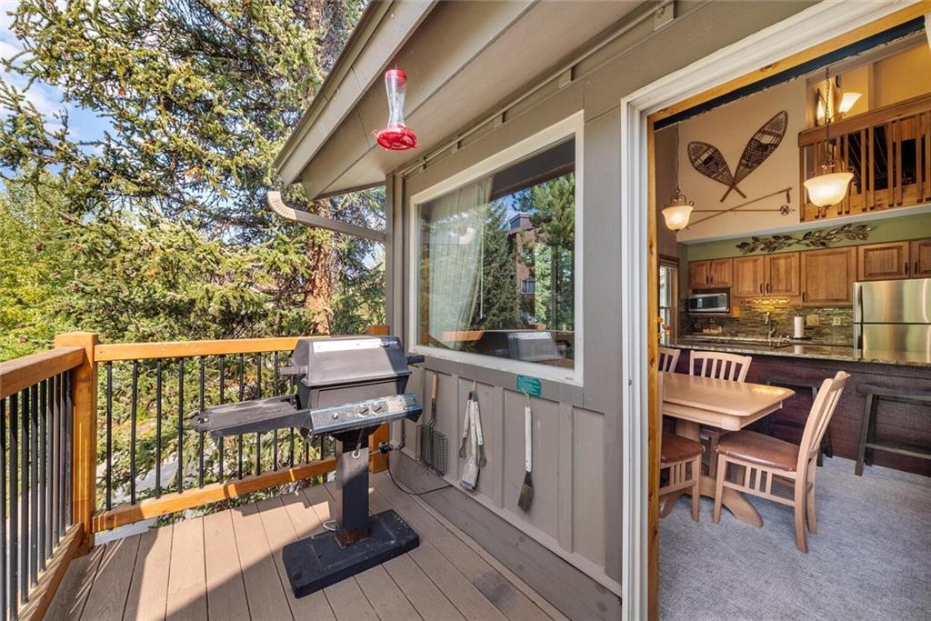 760 Columbine Road, Unit A12 Breckenridge, CO 80424 - Photo 31 of 35 a view of a chairs and table in the balcony