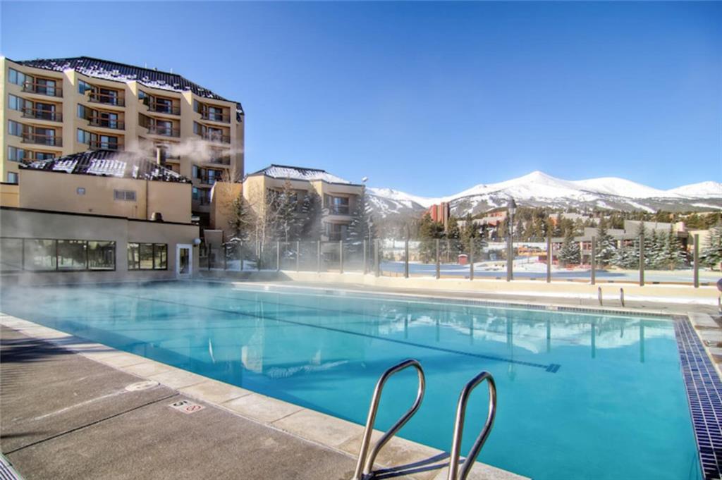 760 Columbine Road, Unit A12 Breckenridge, CO 80424 - Photo 32 of 35 a view of swimming pool with a yard and seating area