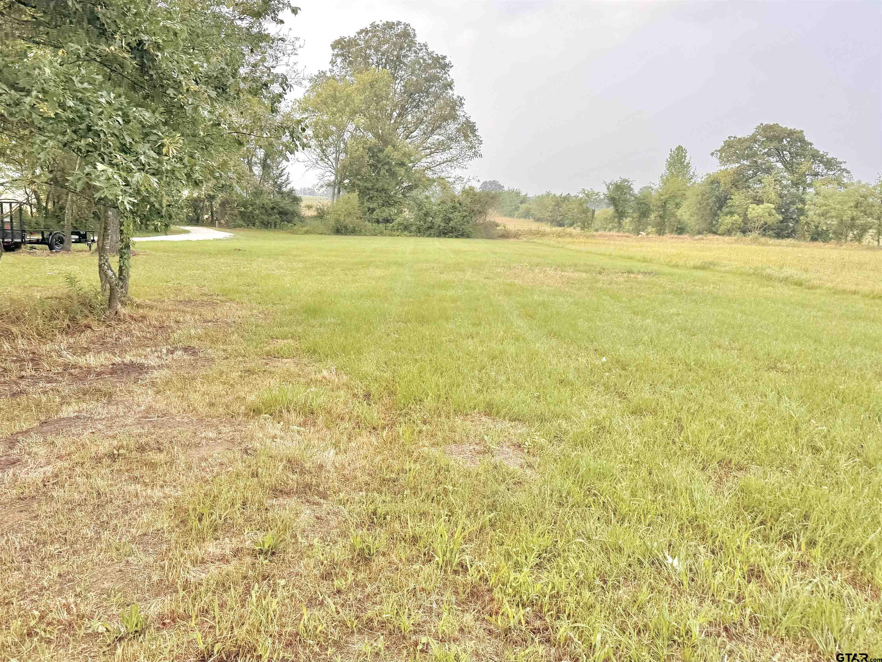 3235 County Road Cookville, TX 75558 - Photo 27 of 38 a view of an ocean and beach