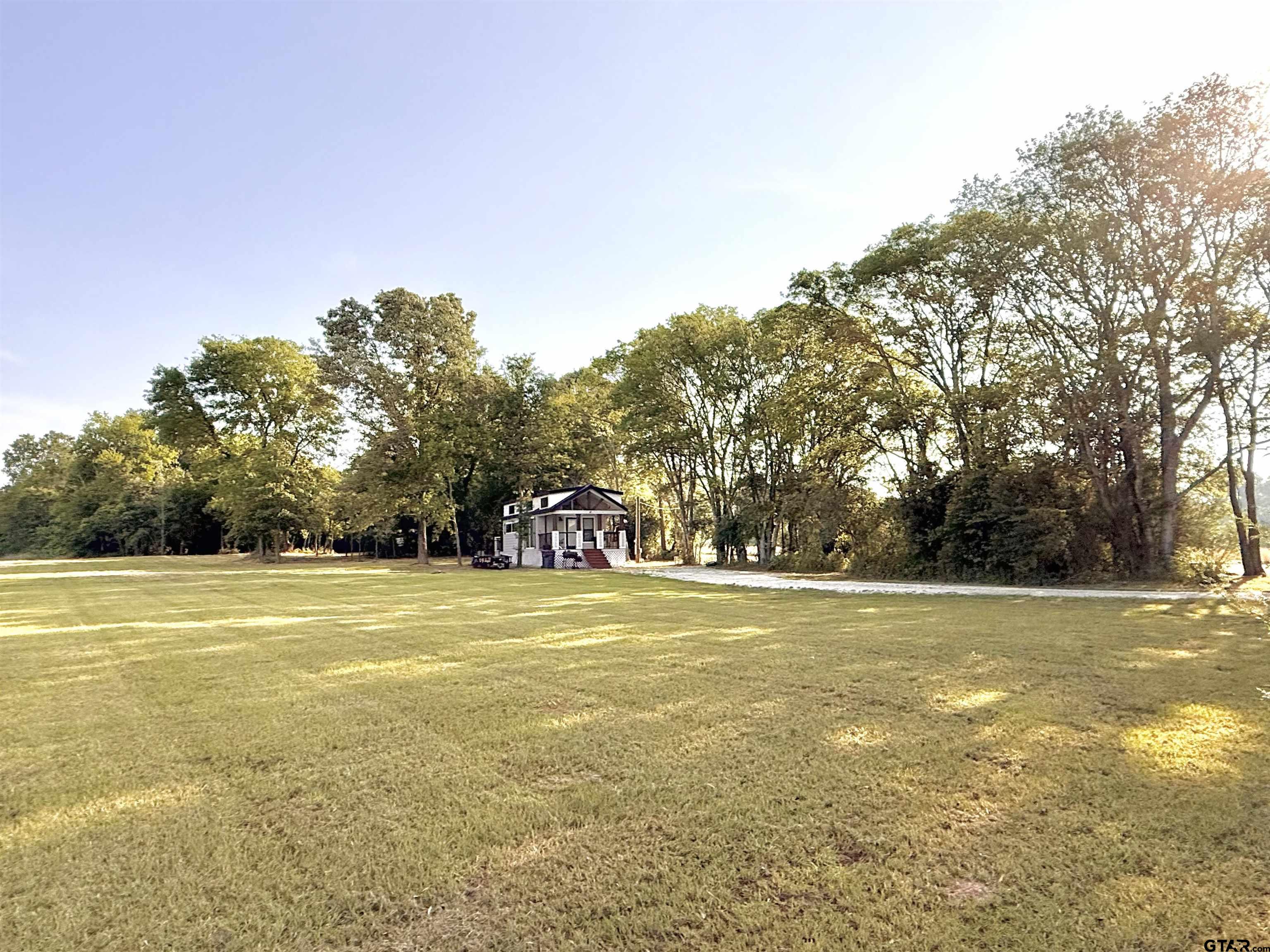 3235 County Road Cookville, TX 75558 - Photo 10 of 38 a view of a ocean view