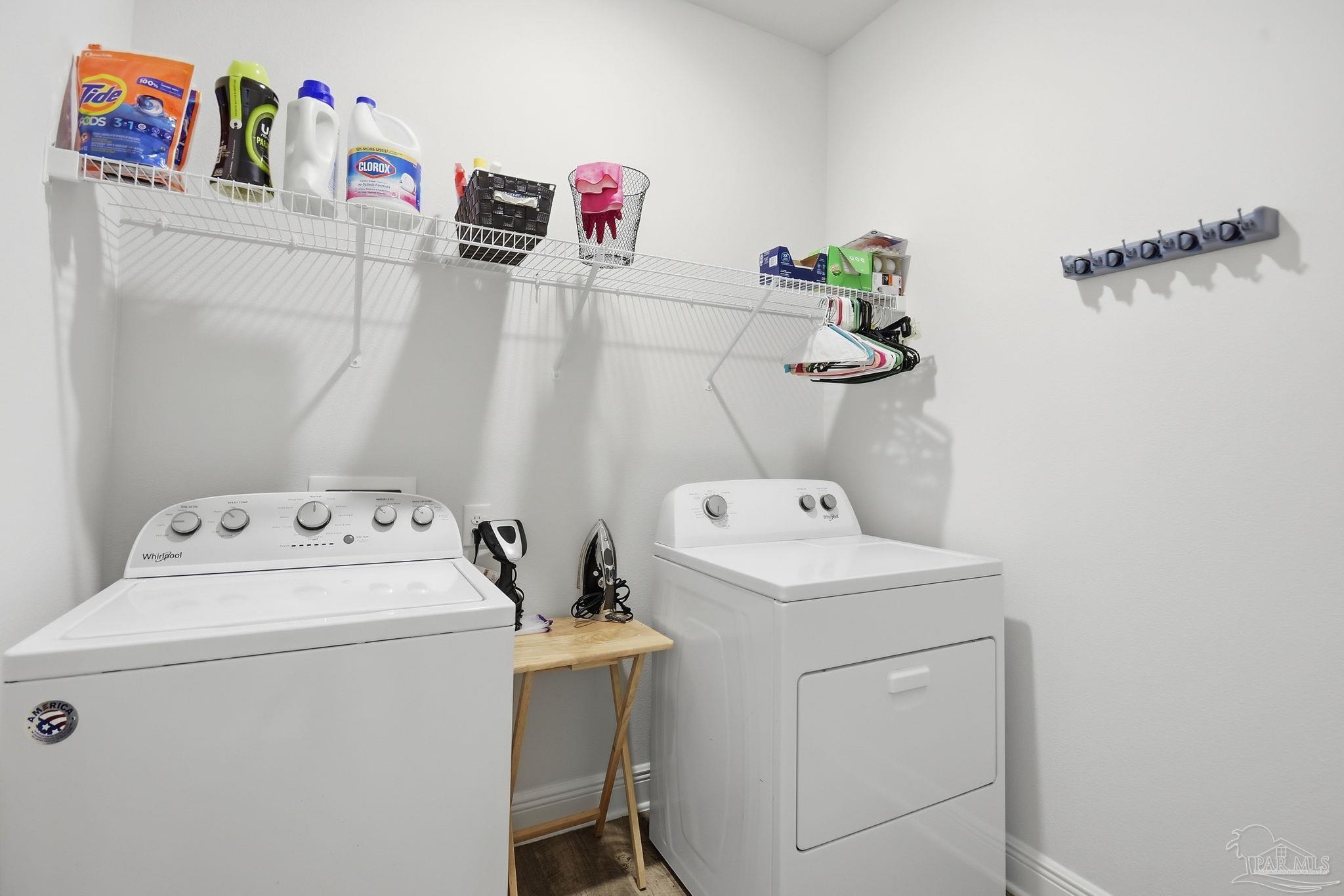 8038 Burnside Loop Pensacola, FL 32526 - Photo 29 of 48 a utility room with dryer and washer