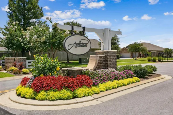 a view of a garden with a pathway and a garden