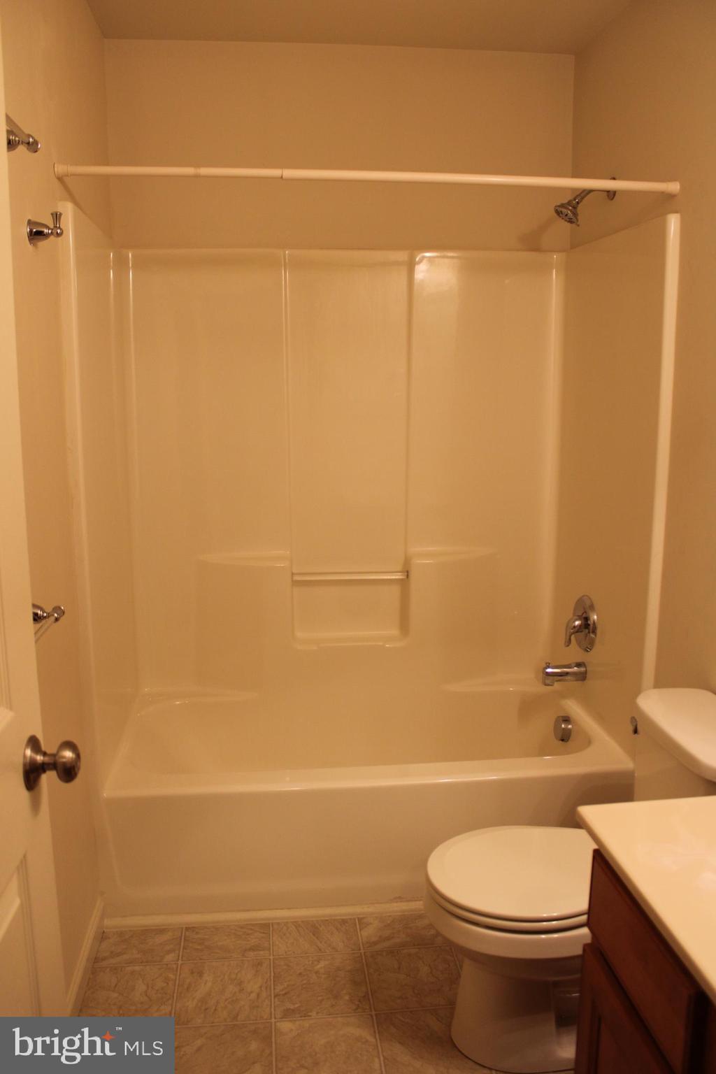 41 Logan Drive New Freedom, PA 17349 - Photo 20 of 27 a bathroom with a toilet and a shower