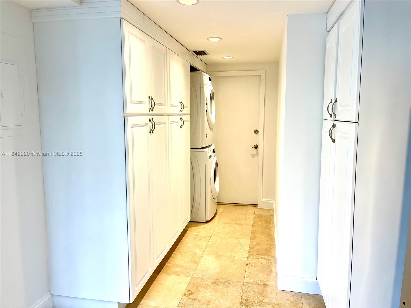 607 Ocean Drive, Unit 3K Key Biscayne, FL 33149 - Photo 15 of 18 a bathroom with a shower and a glass door