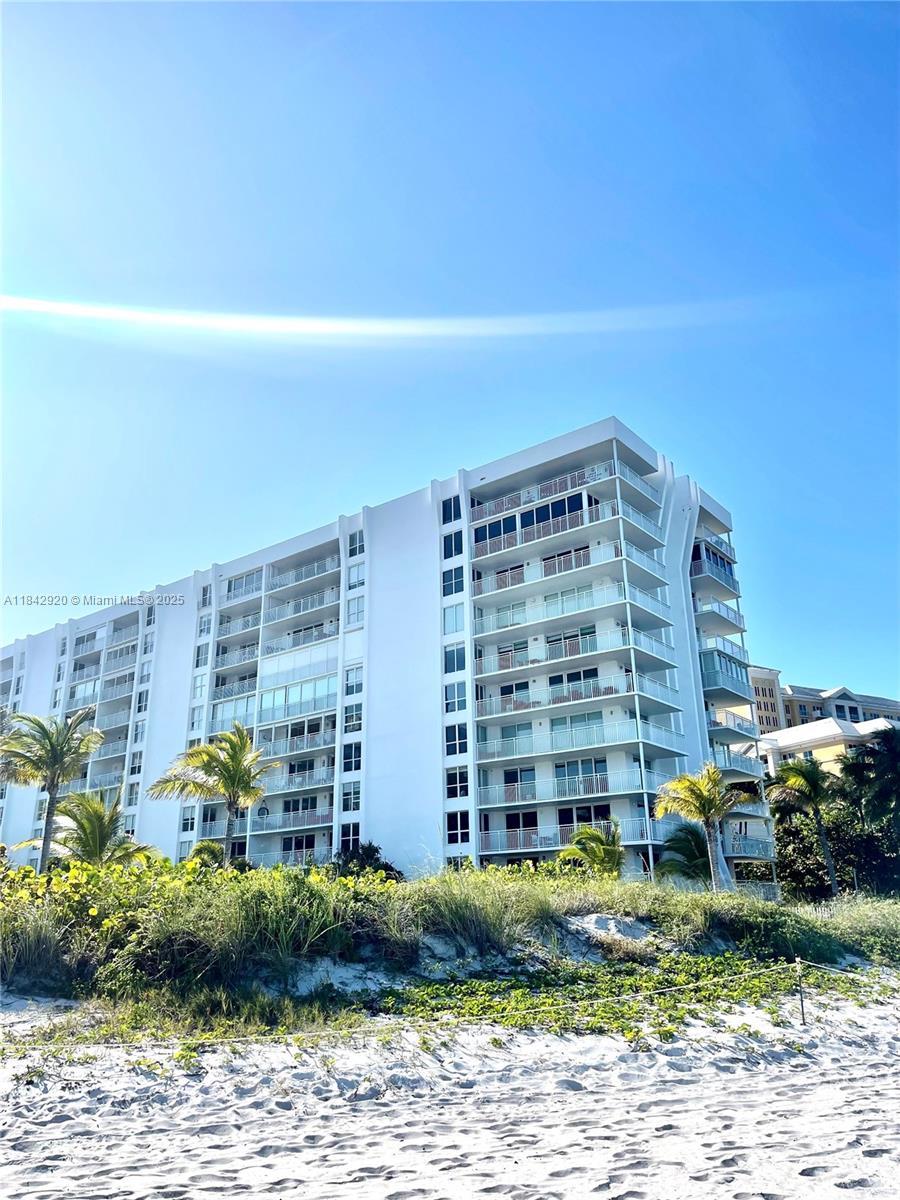 607 Ocean Drive, Unit 3K Key Biscayne, FL 33149 - Photo 8 of 18 a front view of a building