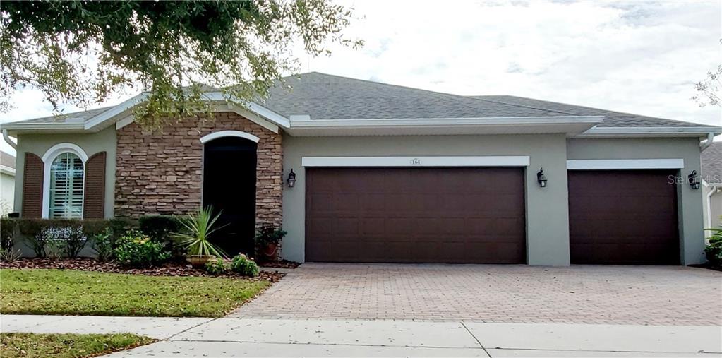 164 Bayou Bend Road Groveland, FL 34736 - Photo 1 of 1 Welcoming exterior with screened front porch