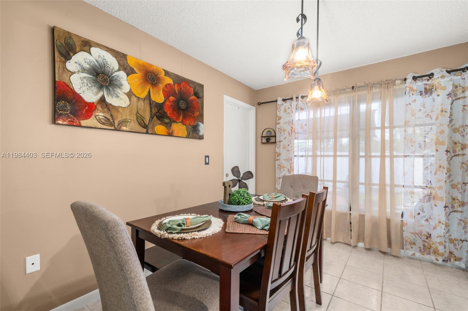 4201 Westminster Road Sebring, FL 33875 - Photo 14 of 43 a view of a dining room with furniture window and outside view