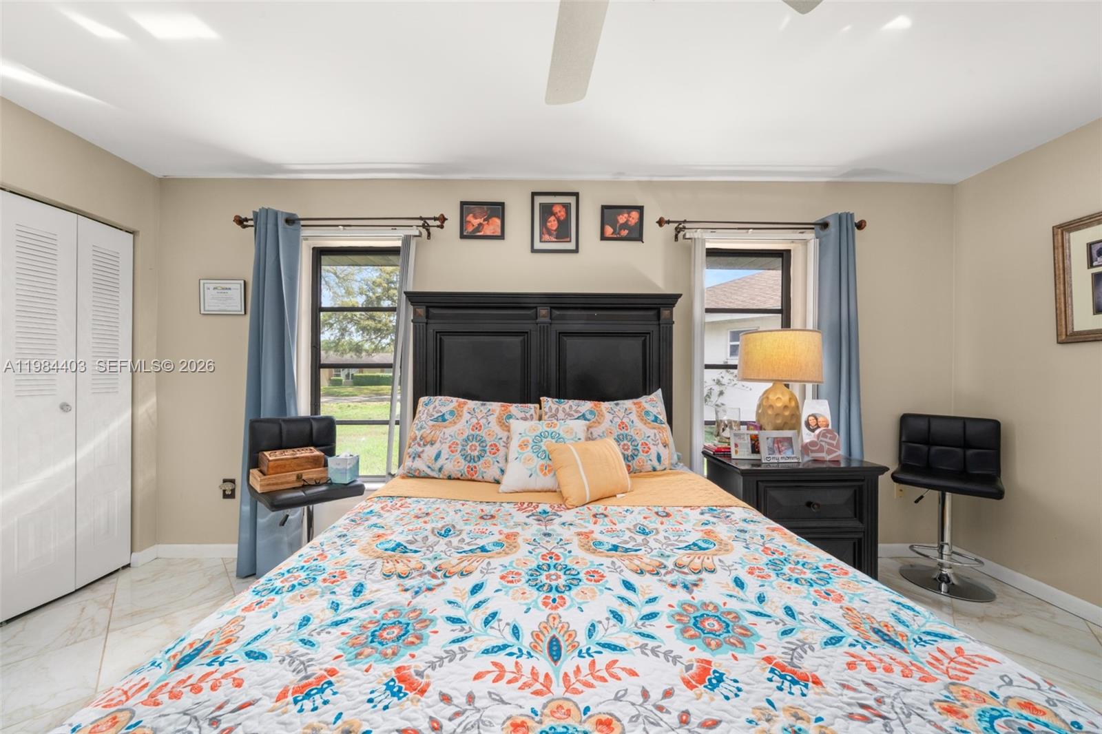 4201 Westminster Road Sebring, FL 33875 - Photo 18 of 43 a bedroom with a bed and wooden floor