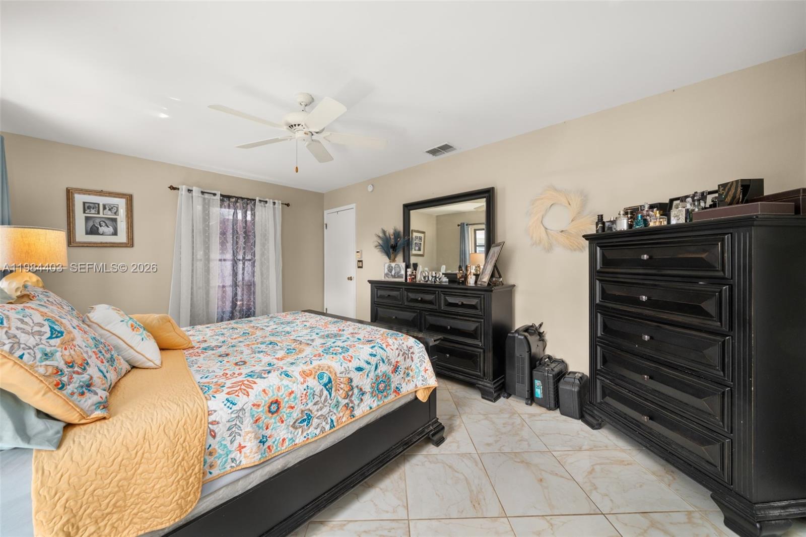 4201 Westminster Road Sebring, FL 33875 - Photo 19 of 43 a bedroom with a bed and dresser