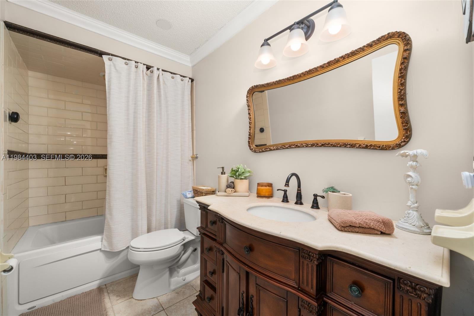 4201 Westminster Road Sebring, FL 33875 - Photo 26 of 43 a bathroom with a double vanity sink toilet and shower