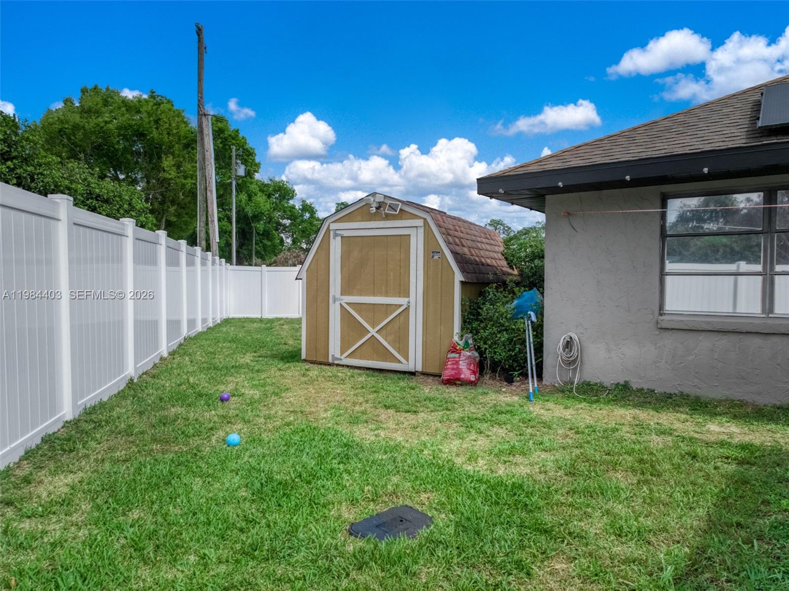4201 Westminster Road Sebring, FL 33875 - Photo 33 of 43 a view of a house with backyard and porch