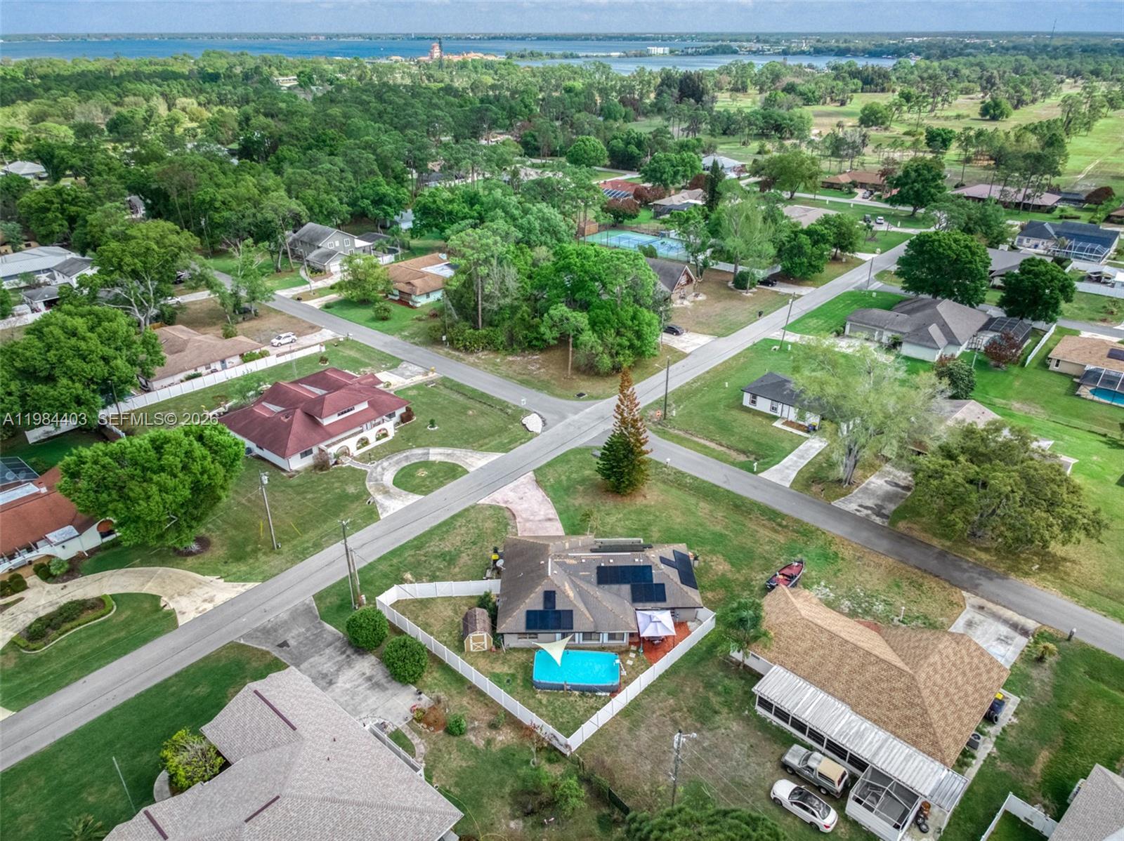 4201 Westminster Road Sebring, FL 33875 - Photo 42 of 43 an aerial view of residential houses with outdoor space and street view
